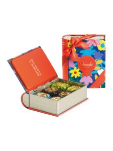 Venchi assorted chocolates in a book-shaped metal tin