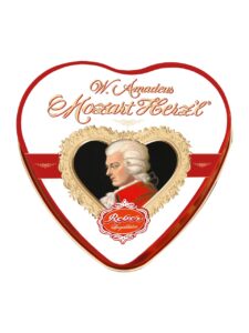 Reber Mozat dark chocolate balls filled with pistachio marzipan and truffles, in a heart-shaped tin