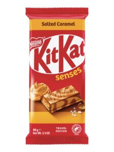 KitKat Tablet covered with caramel flavoured milk chocolate and white coating with a salted caramel flavoured filling